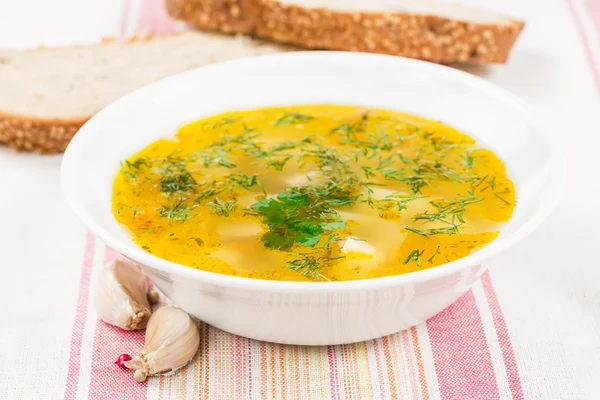Pea soup with herbs and bread — Stock Photo, Image