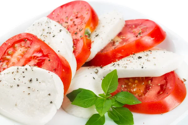 Mozzarella, tomatoes and pepper — Stock Photo, Image