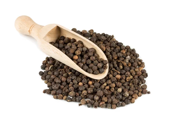 Black pepper in a spoon — Stock Photo, Image