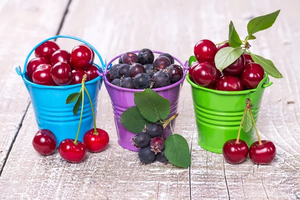 Three buckets of berries — Stock Photo, Image