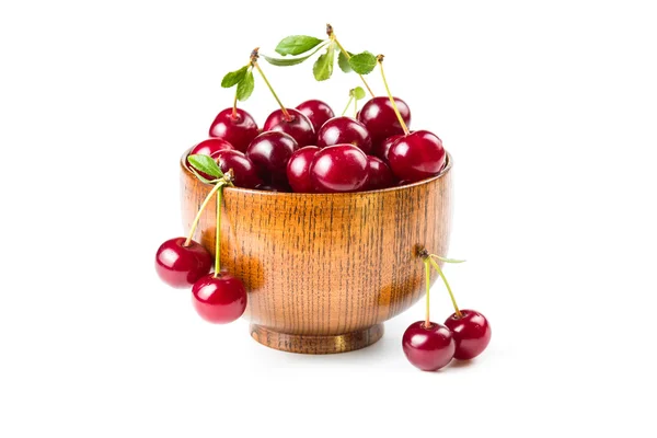 Ripe cherries in a wooden bowl — Stock Photo, Image