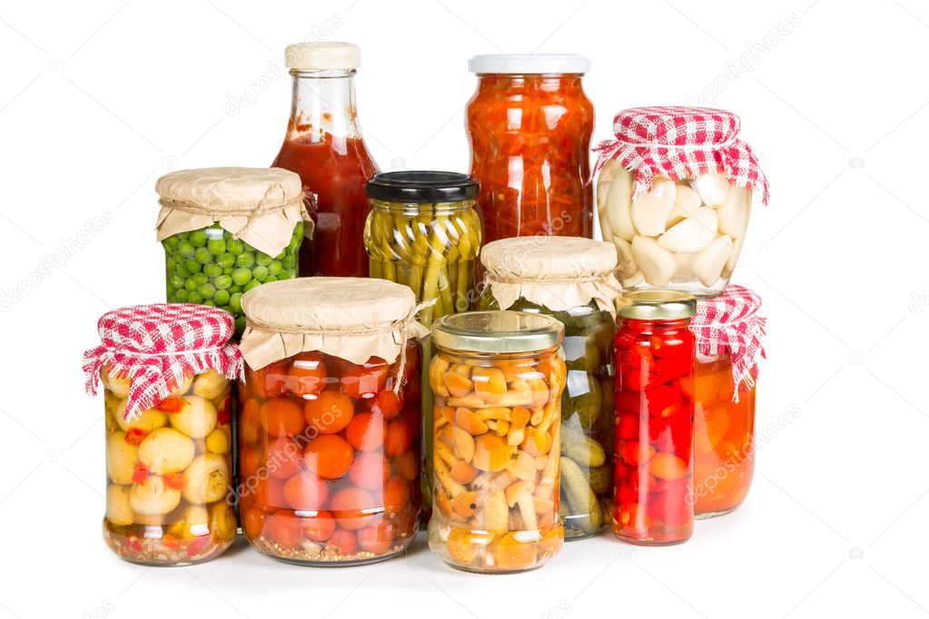 Marinated vegetables in glass jars