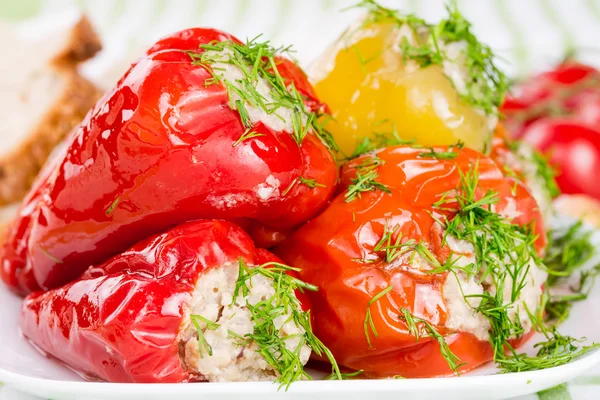 Stuffed red and green peppers — Stock Photo, Image