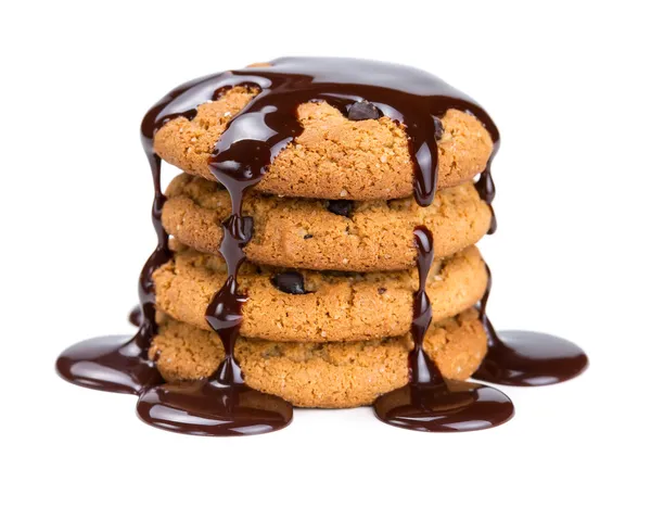 Yulaflı kurabiyeler, sulanan sıvı çikolata — Stok fotoğraf