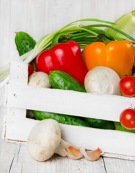 Fresh vegetables in a wooden box — Stock Photo, Image