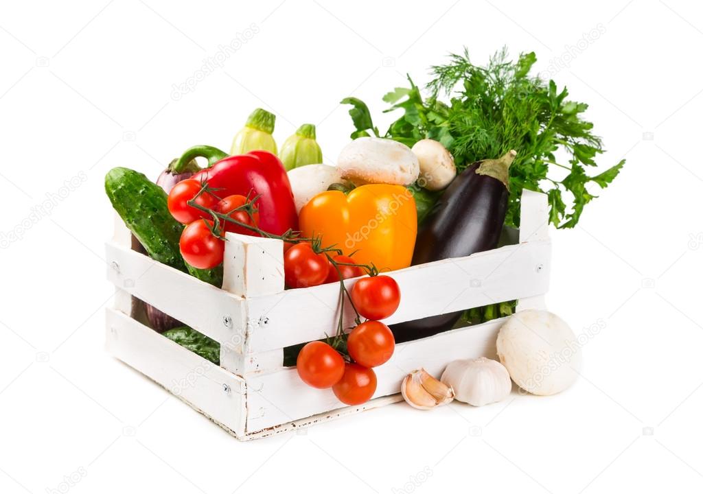 Fresh vegetables in a painted wooden box
