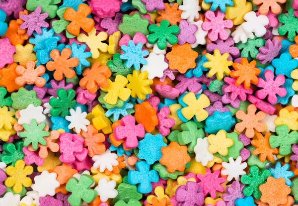Colorida estrella del azúcar y flor —  Fotos de Stock