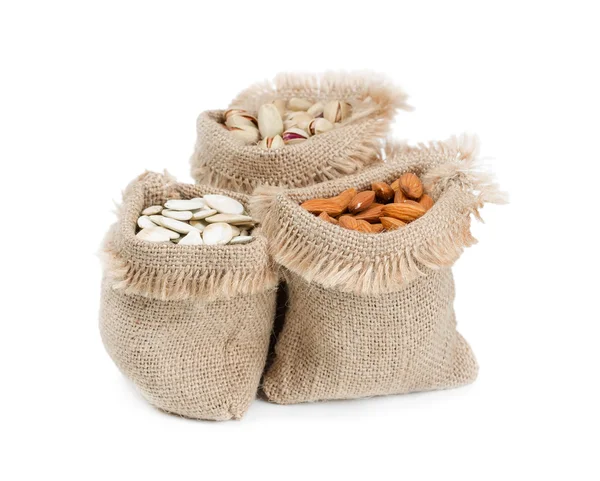 Bags with different nuts — Stock Photo, Image