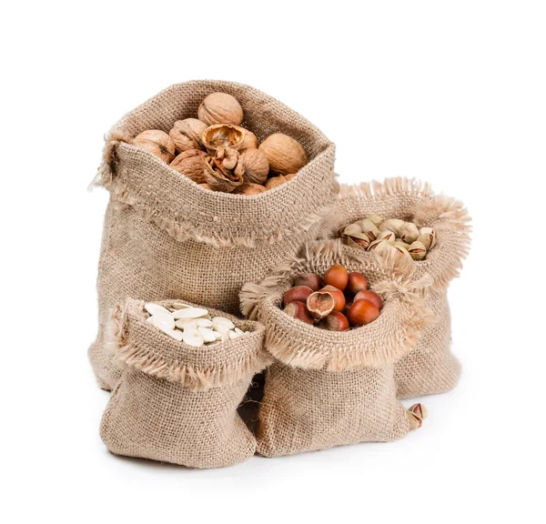 Bags with different nuts — Stock Photo, Image