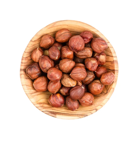 Hazelnuts in a wooden bowl — Stock Photo, Image