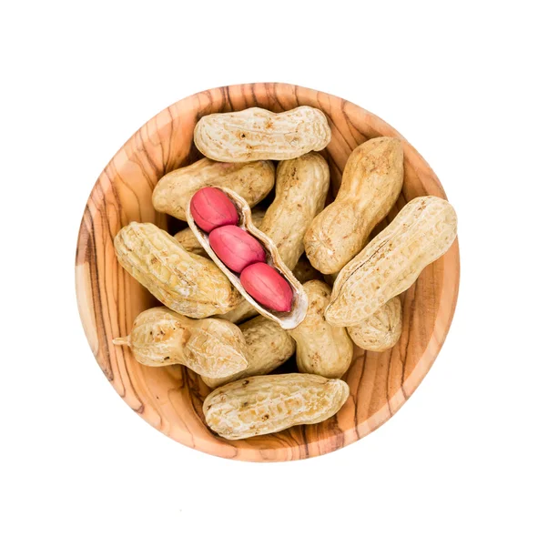 Peanuts in a wooden bowl — Stock Photo, Image