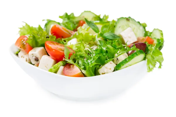 Salad with fresh vegetables in a ceramic bowl — Stock Photo, Image