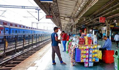 Unidentified people walk at Lucknow Junction Railway Station on march 2022 in Lucknow, India