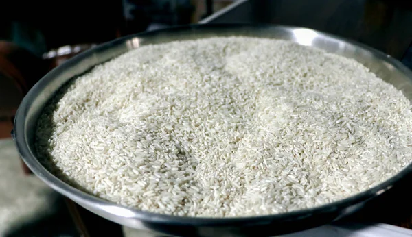 Pile Uncooked Rice Plate Dark Background — Stock Photo, Image