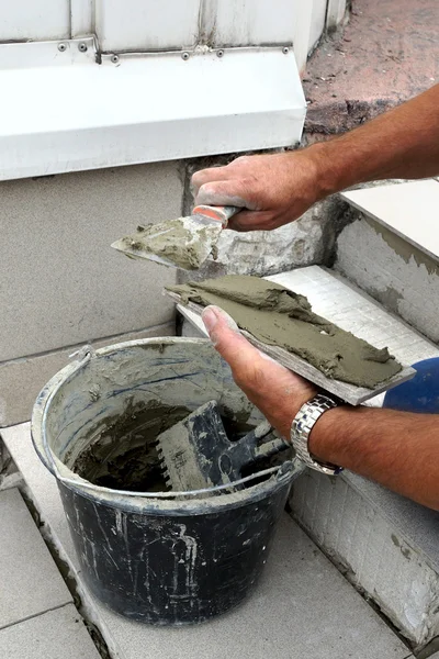 Real photo of a tile laying — Stock Photo, Image