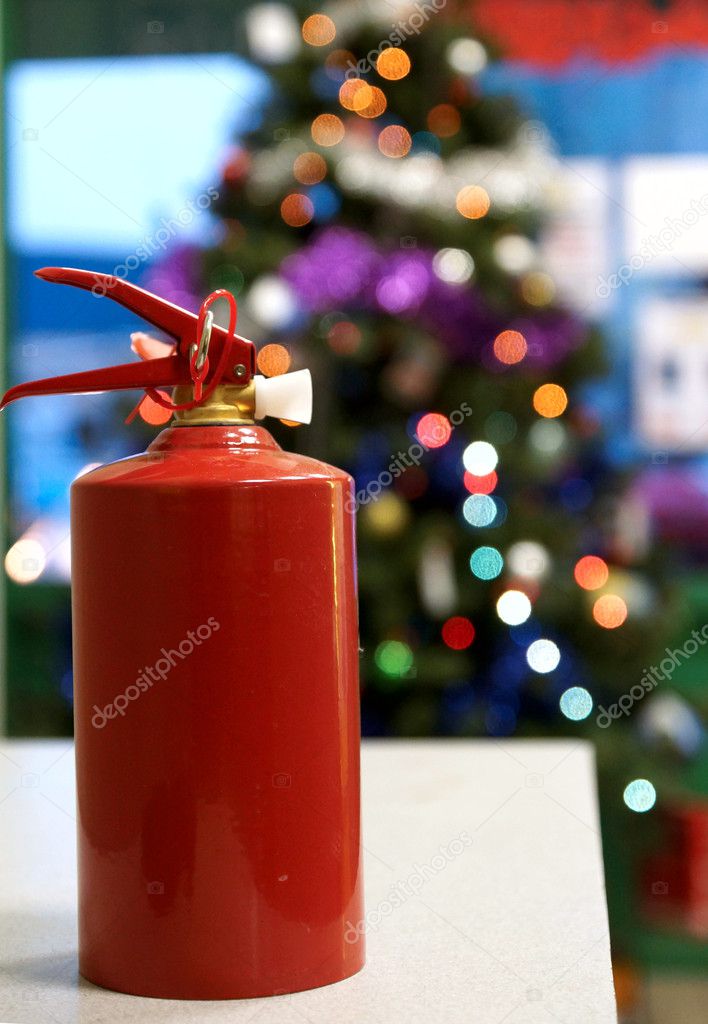 Fire extinguisher and New Year tree