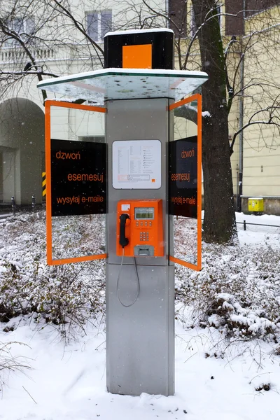 Oranžové veřejné telefonní — Stock fotografie