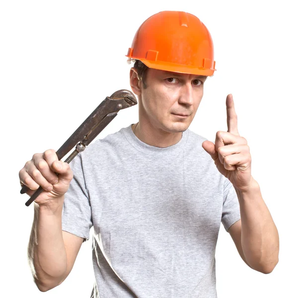 Aletlerle çalışan tesisatçı.