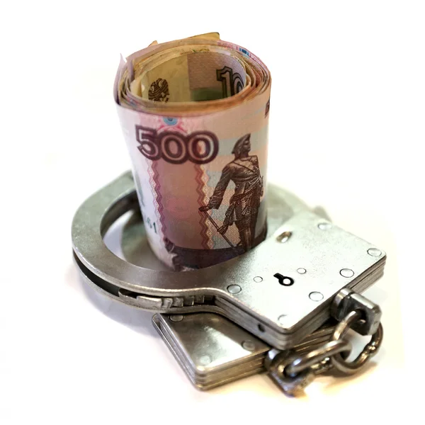 Handcuffs and rubles — Stock Photo, Image