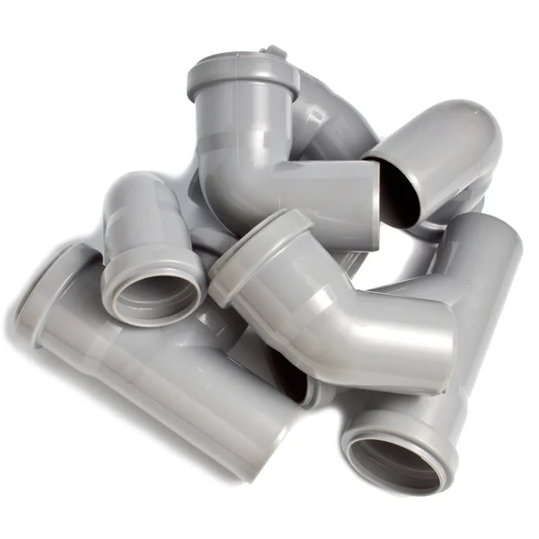 Composition from plastic sewer pipes — Stock Photo, Image