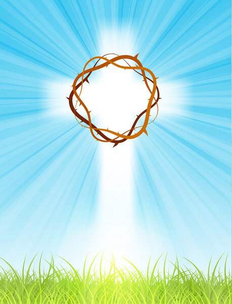 cross on blue sky, with sun rays and green lawn