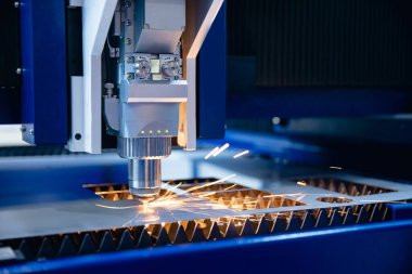 Metal CNC lazer oymacılığının makro fotoğraf kesimi. Arkaplan kavramı modern endüstriyel teknoloji