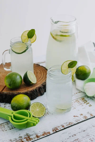 Jar Glass Lemonade Drink Green Lemons Lime White Background Latin —  Fotos de Stock