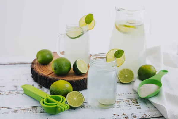 Jar Glass Lemonade Drink Green Lemons Lime White Background Latin —  Fotos de Stock