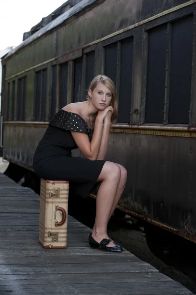 Blond woman near an old train — Stock Photo, Image