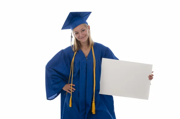 Girl graduate holding sign with copyspace — Stock Photo, Image