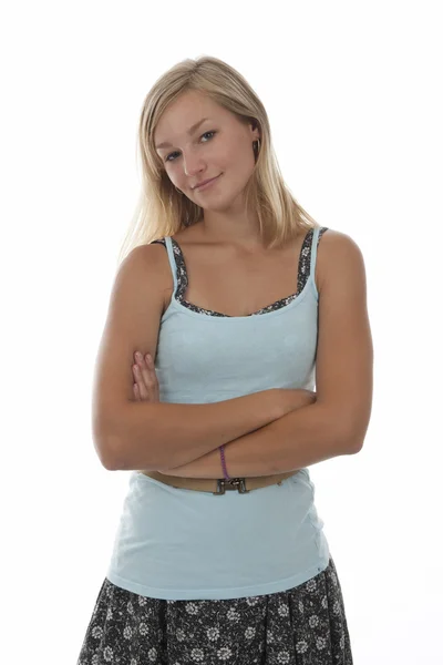 Mooie tiener meisje met gekruiste armen — Stockfoto