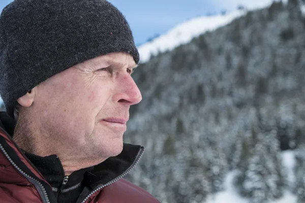 Mature adult man in winter landscape — Stock Photo, Image