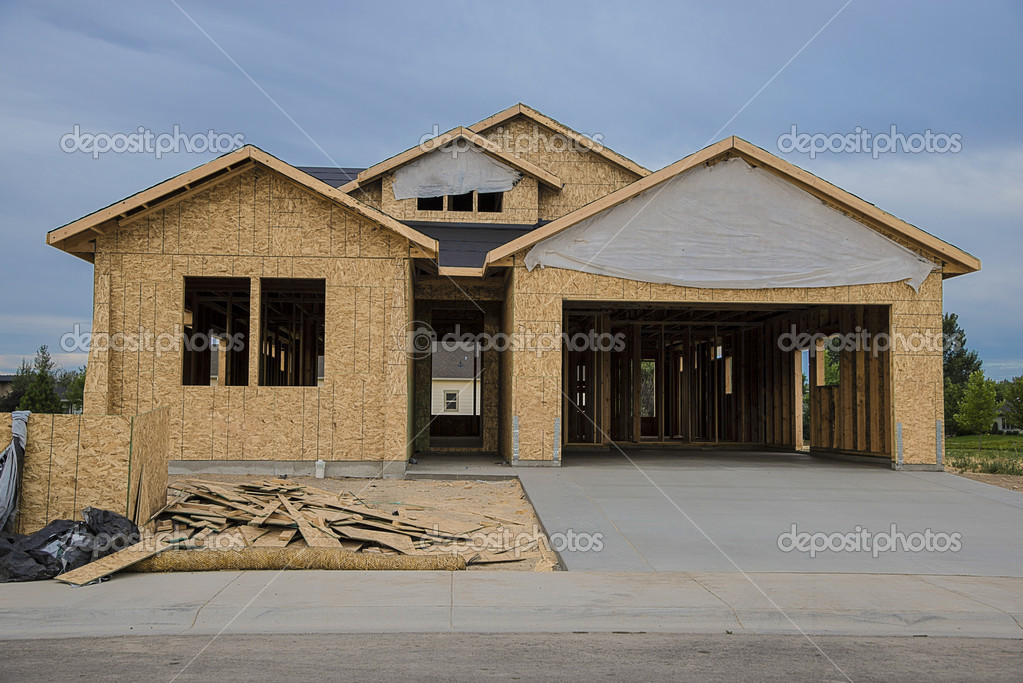 Unfinished house in construction Stock Editorial Photo © robertcrum