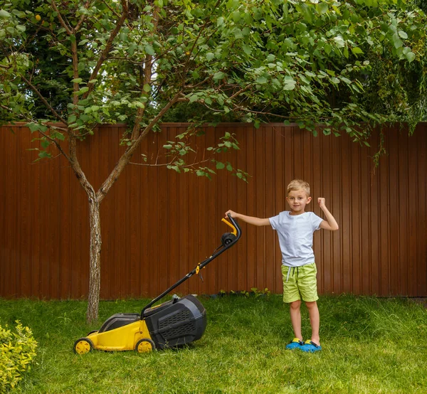 Blond Boy Mowing Lawn Garden Yellow Lawn Mower Sunny Summer — Photo