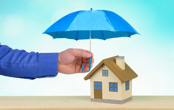Blue Umbrella Protect Home Real Estate Property Protection Concept — Stock Photo, Image