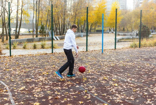 Cute Teenager White Hoodie Playing Basketball Young Boy Red Ball — Fotografia de Stock