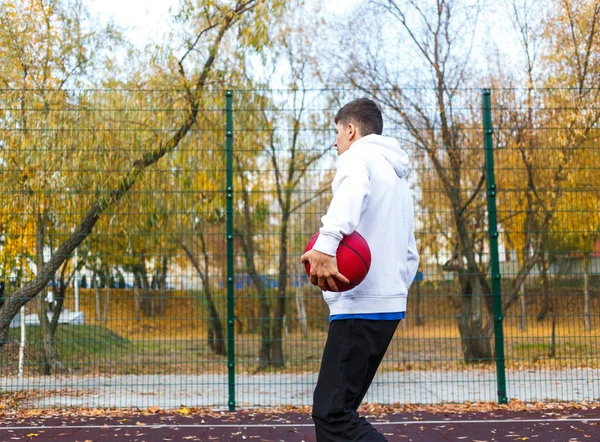 Cute Teenager White Hoodie Playing Basketball Young Boy Red Ball — Stok fotoğraf