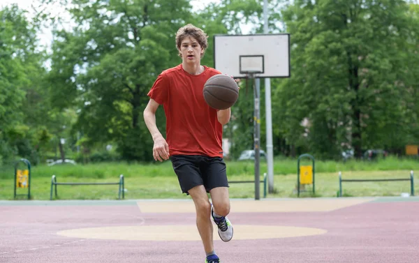 Teenager Running Stadium Cute Young Teenager Red Shirt Ball Plays — Stockfoto