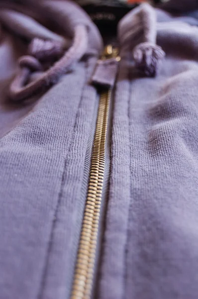 Ritssluiting op een blauwe trui — Stockfoto