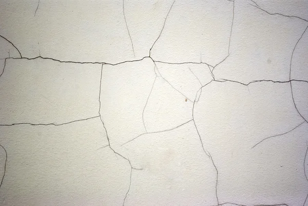 Παλιό λευκό τοίχο με ρωγμές — Φωτογραφία Αρχείου