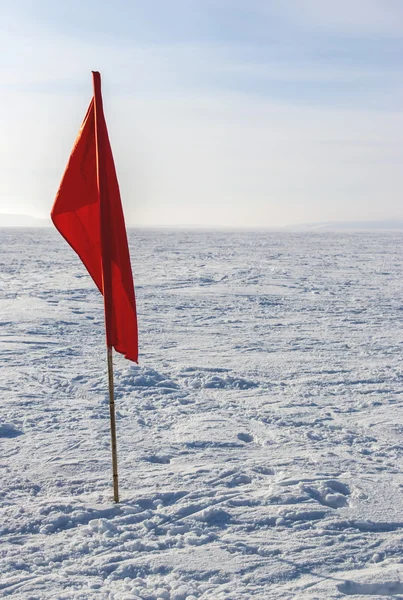 Bandera en la nieve — Foto de Stock