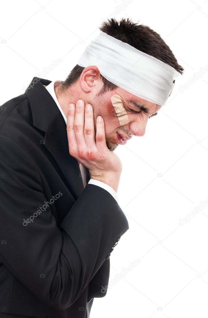 man with bandage over head
