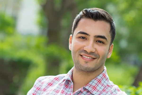 Young man outdoors — Stock Photo, Image