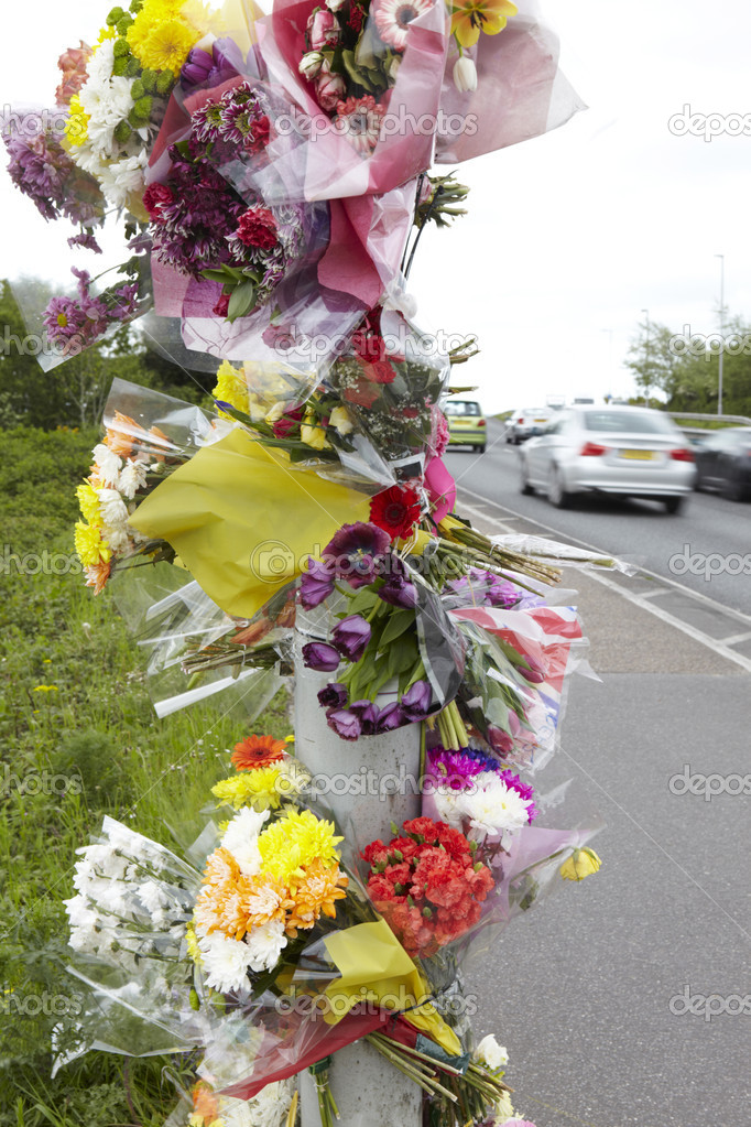 Floral Tributes At Site Of Road Traffic Accident