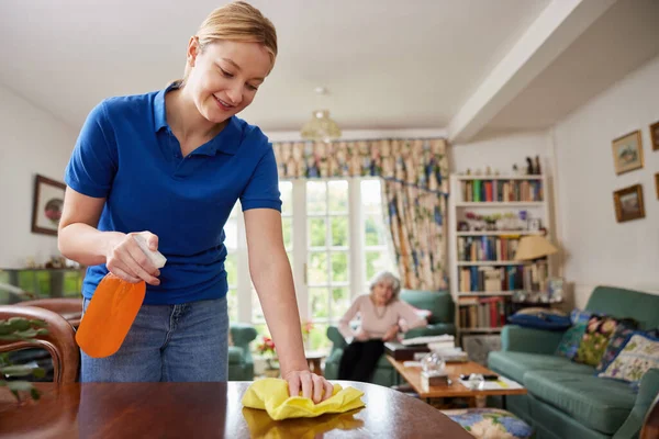 Female Home Help Cleaning House Talking Senior Woman — Stock Photo, Image