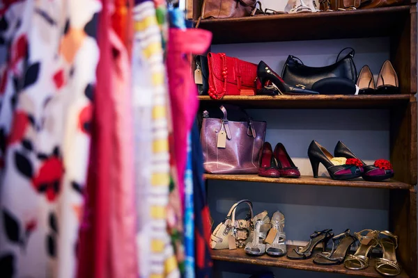 Interior Of Charity Shop Or Thrift Store Selling Used And Sustainable Clothing Shoes And Handbags