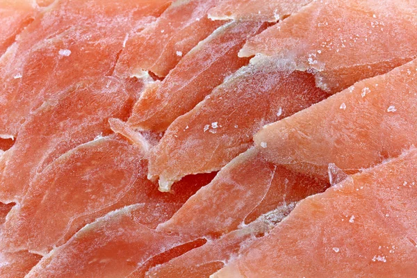 Frozen sliced raw salmon — Stock Photo, Image