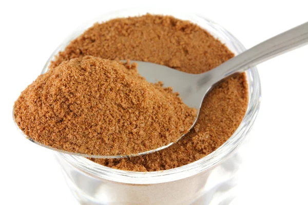 Closeup photo : a tablespoon of chocolate (cocoa) Powder — Stock Photo, Image