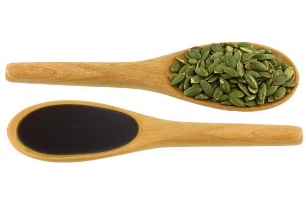 Pumpkin Seed Oil and Roasted Pumpkin Seeds — Stock Photo, Image