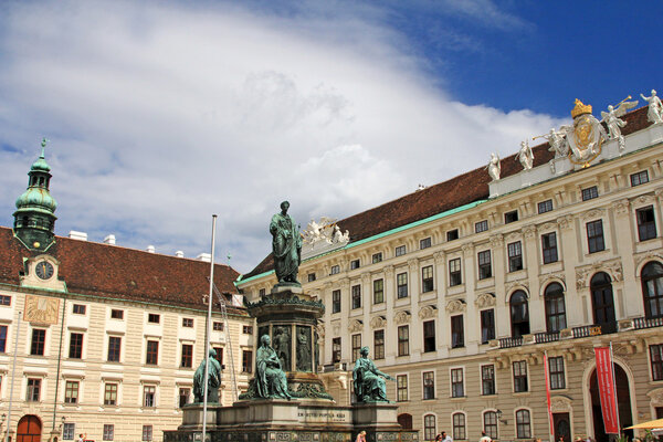 Statue of Francis II, Holy Roman Emperor in the courtyard square in the Hofburg - Vienna. The monument was created in 1824-1846 by the Pompeo Marchesi. The Emperor wears classic Roman outfit, standing on a tall plinth with other 4 statues.